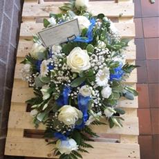 All white oasis spray with blue ribbon medium size