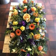 Vibrant coffin spray 