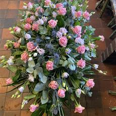 Pinks and lilacs roses casket spray 3ft